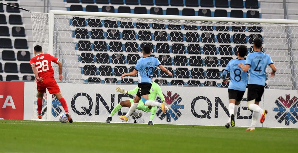 Al Arabi's Youssef Msakni (left) shoots at the goal. PIC: Amr Diab