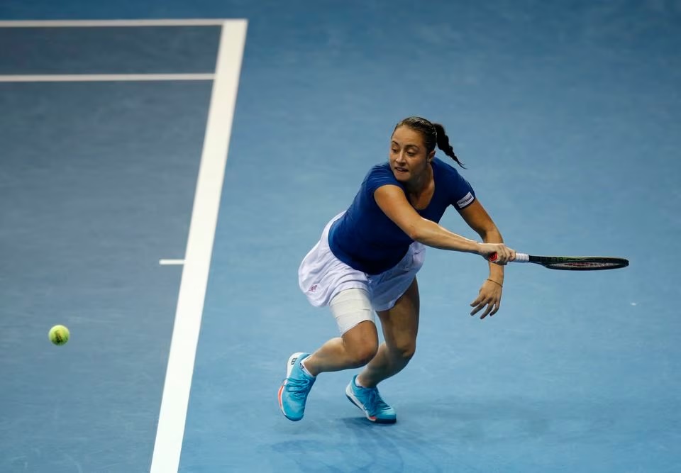 Tennis - Billie Jean King Cup Finals - Emirates Arena, Glasgow, Scotland, Britain - November 10, 2022 Italy's Elisabetta Cocciaretto in action during her match in the group stage against Canada's Bianca Vanessa Andreescu Action Images via Reuters/Ed Sykes