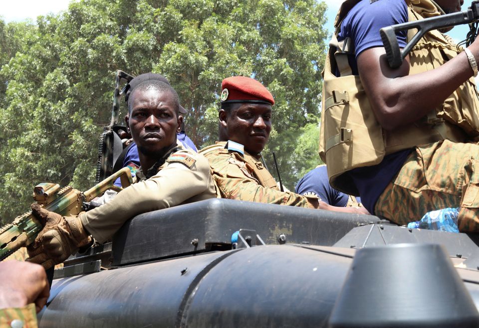 Burkina Faso's military leader Ibrahim Traore is escorted by soldiers while he stands in an armoured vehicle in Ouagadougou, Burkina Faso on October 2, 2022. File Photo / Reuters