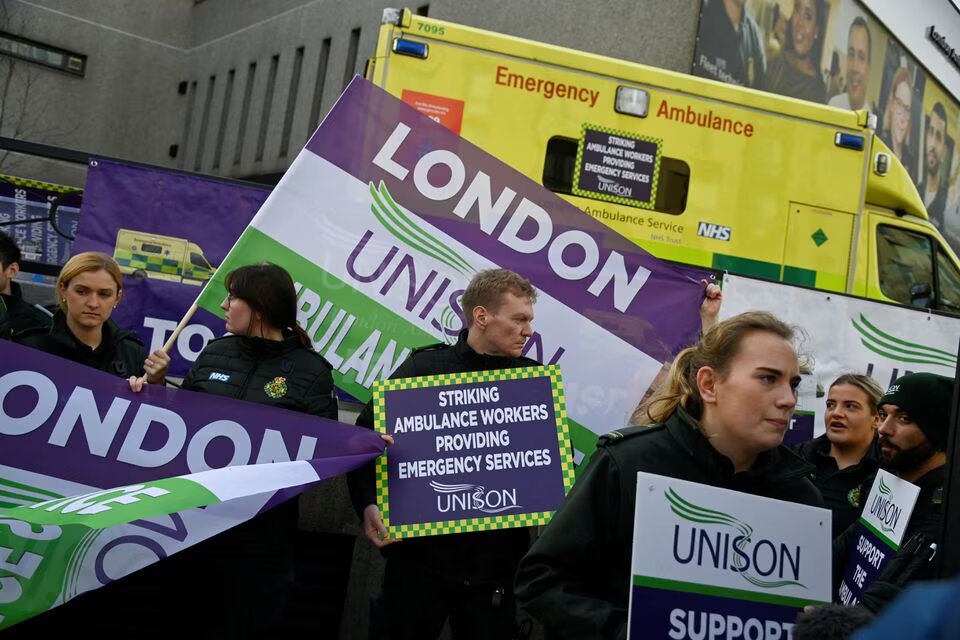 Ambulance workers strike outside their Waterloo station, amid a dispute with the government over pay, in London, Britain on January 11, 2023. REUTERS/Toby Melville
