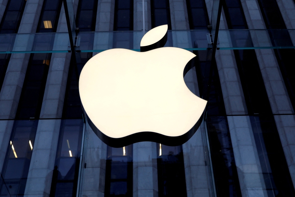 File Photo: The Apple Inc. logo is seen hanging at the entrance to the Apple store on 5th Avenue in Manhattan, New York, US, October 16, 2019. (REUTERS/Mike Segar)