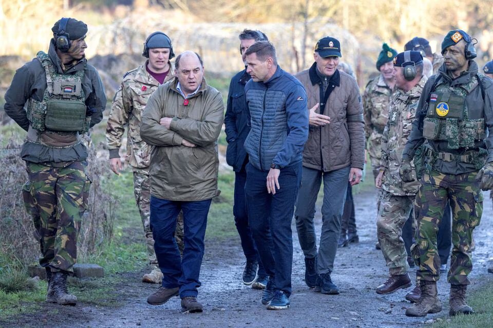 British Defence Secretary Ben Wallace walks, as he visits soldiers from the Armed Forces of Ukraine who are taking part in the UK-led basic training programme, on a military training camp, in an unspecified location in the North East of England, Britain, on November 9, 2022.  File Photo / Reuters