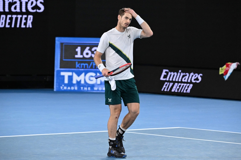 Britain's Andy Murray celebrates after victory against Australia's Thanasi Kokkinakis during their men's singles match on day four of the Australian Open tennis tournament in Melbourne on January 20, 2023. (Photo by WILLIAM WEST / AFP)
