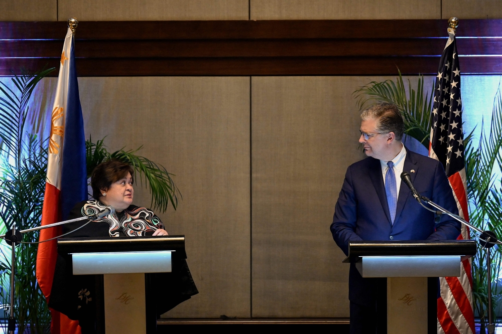 Foreign Affairs Undersecretary for Bilateral Relations and ASEAN Affairs Theresa Lazaro and US Assistant Secretary of State for East Asian and Pacific Affairs Daniel J. Kritenbrink attend a press conference during 10th US-Philippines Bilateral Strategic Dialogue in Manila on January 20, 2023. (Photo by Jam Sta Rosa / AFP)