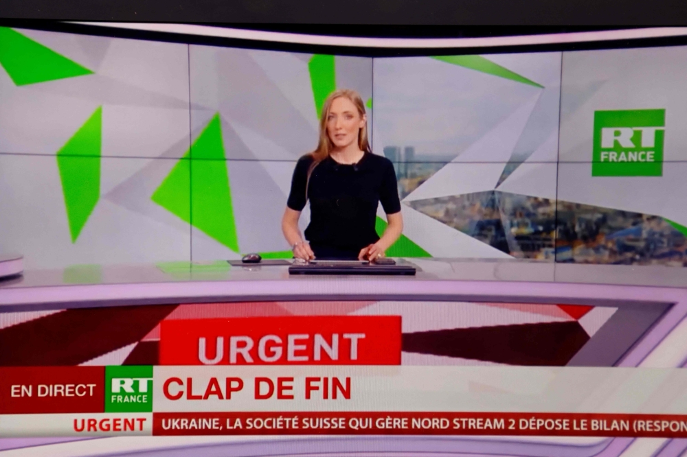 This file photo taken in Paris on March 2, 2022 shows RT France network last live emission due to a european union decision after the Russia's invasion of Ukraine. - Moscow will retaliate against French media in Russia after the bank accounts of RT France, the French arm of its state broadcaster, were frozen, Russian news agencies reported on January 21, 2023. (Photo by Ludovic MARIN / AFP)