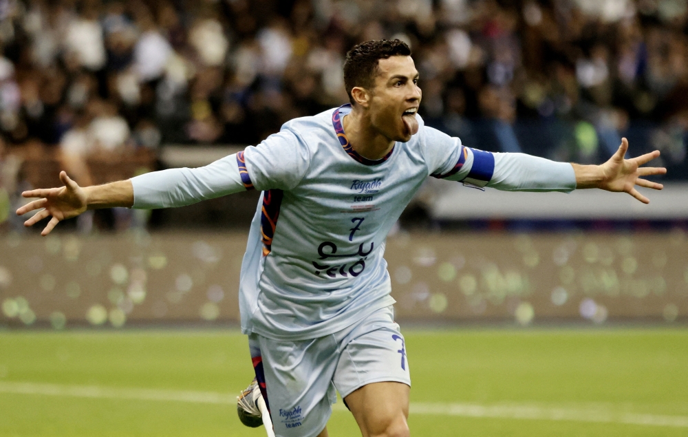 Saudi Pro League XI's Cristiano Ronaldo celebrates scoring their second goal during the friendly match against Paris St Germain at the King Fahd International Stadium, Riyadh, Saudi Arabia on January 19, 2023.  REUTERS/Ahmed Yosri/File Photo