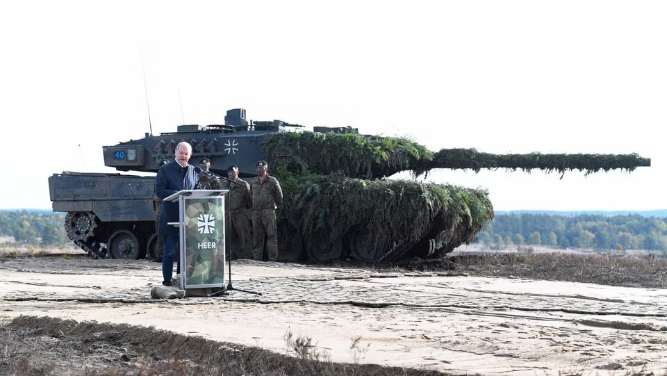 German Chancellor Olaf Scholz delivers a speech in front of a Leopard 2 tank during a visit to a military base of the German army Bundeswehr in Bergen, Germany, on October 17, 2022. File Photo / Reuters
