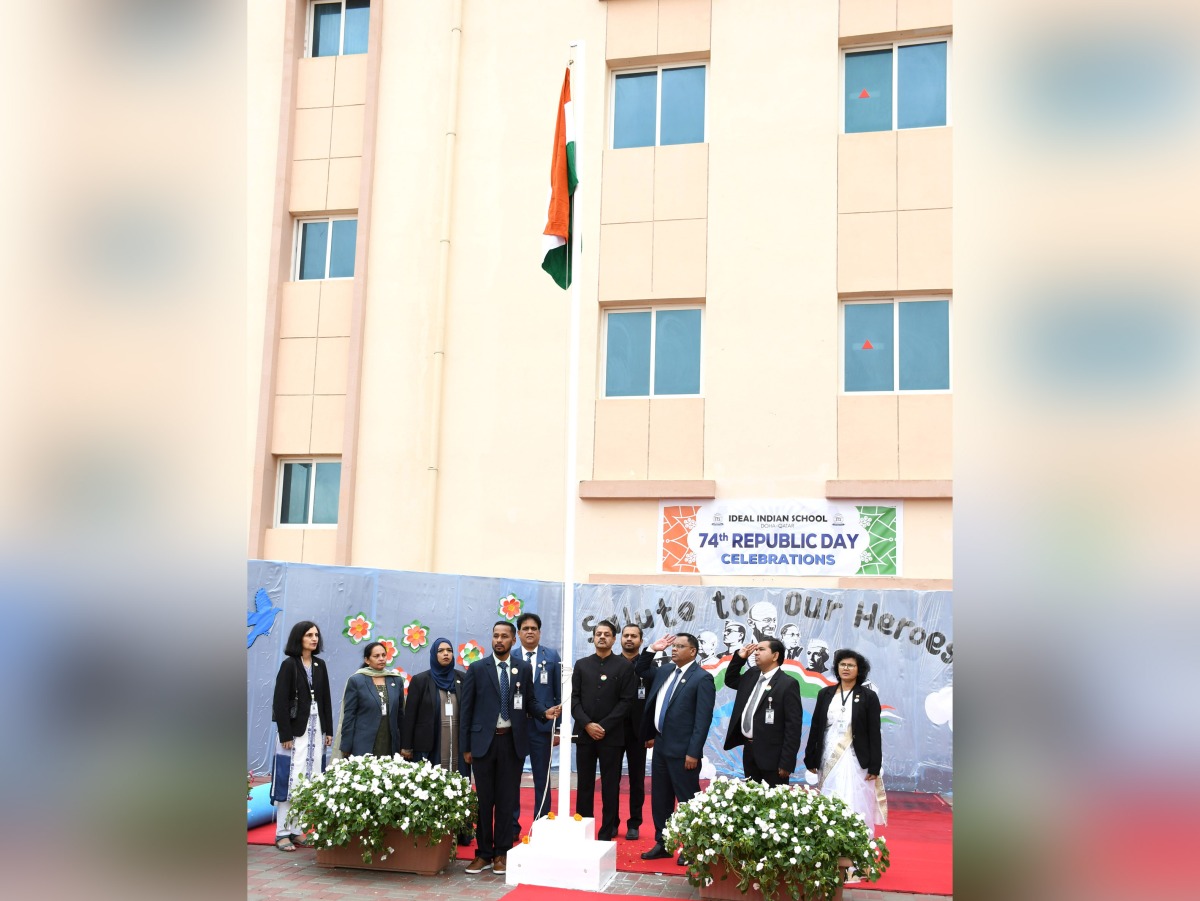 School President Dr. Hassan Kunhi M P unfurling the national flag at the school premises.