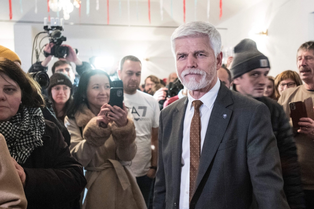 Presidential candidate and former Chief of the General Staff of the Army of the czech Republic Petr Pavel meets with supporters during in the presidential elections on January 27, 2023 in Cernoucek village, czech Republic. - Petr Pavel will face billionaire lawmaker Andrej Babis in the second round of the Presidential Elections on January 27 and 28, after having secured a narrow first place in the first round. (Photo by Michal Cizek / AFP)
