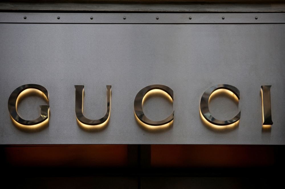 A Gucci sign is seen outside a shop in Paris, France, January 27, 2023. Reuters/Sarah Meyssonnier/File Photo