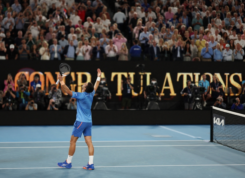 January 29, 2023 Serbia's Novak Djokovic celebrates winning his final match against Greece's Stefanos Tsitsipas REUTERS/Loren Elliott 
