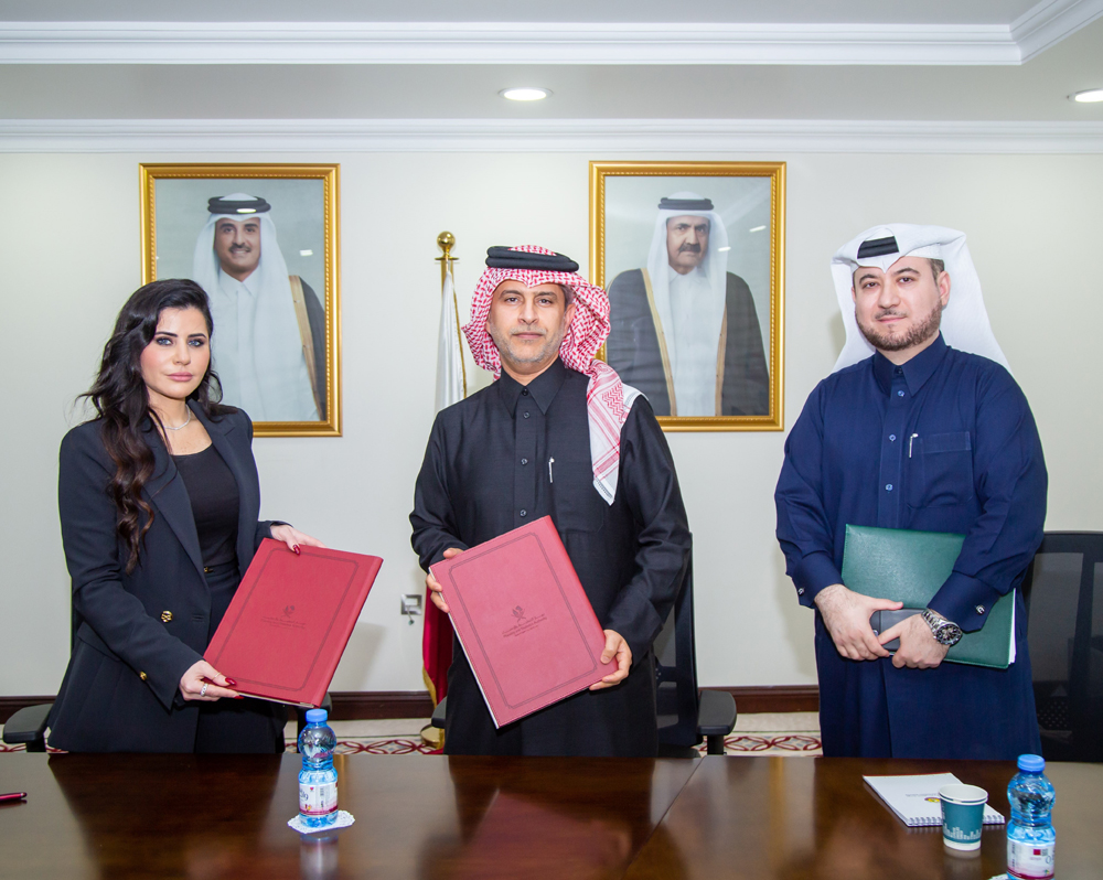 PSA Assistant President Mohammed Abdulaziz Al Naimi and General Manager of Microsoft Doha Lana Khalaf exchanging the MoU at  PSA premises.