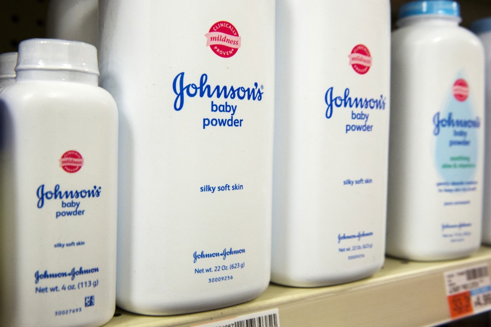 Bottles of Johnson & Johnson baby powder line a drugstore shelf in New York October 15, 2015. (REUTERS/Lucas Jackson)