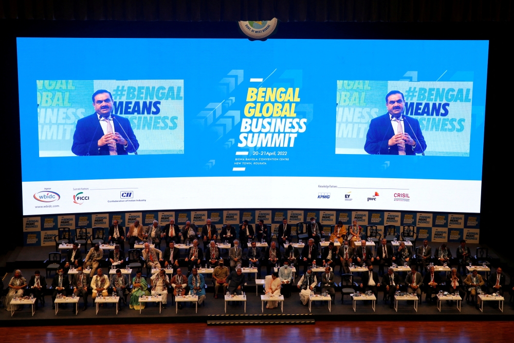Indian billionaire Gautam Adani is seen on a screen as he addresses delegates during the Bengal Global Business Summit in Kolkata, India on April 20, 2022. File Photo / Reuters
