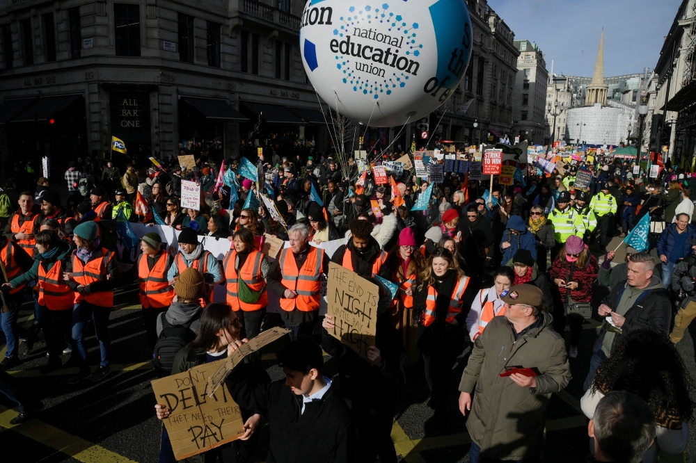 Striking workers attend a march, in London, Britain February 1, 2023. REUTERS/Toby Melville

