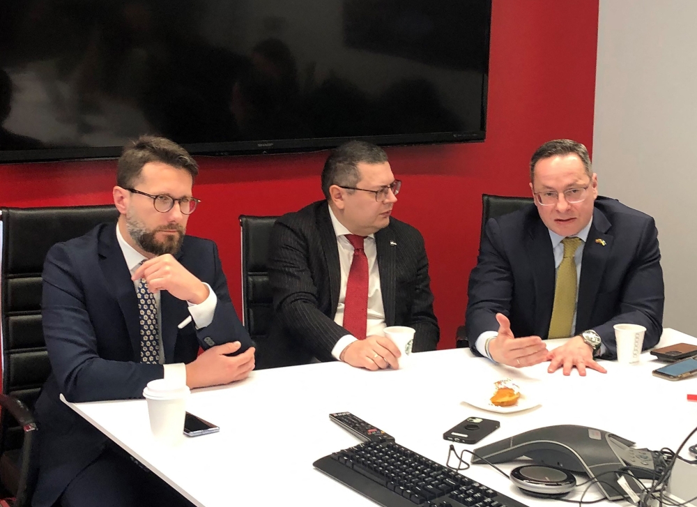 (From left) Radoslaw Fogiel, Oleksandr Merezhko and Zygimantas Pavilionis, the chairs of the parliamentary foreign affairs committee respectively of Poland, Ukraine and Lithuania, speak to reporters from the State Department Correspondents' Association at the AFP bureau in Washington, DC, on February 1, 2023. (Photo by Shaun Tandon / AFP)