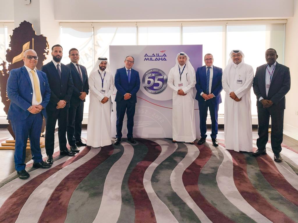 Officials from Milaha and Oracle pose for a photo session during the MoU signing.