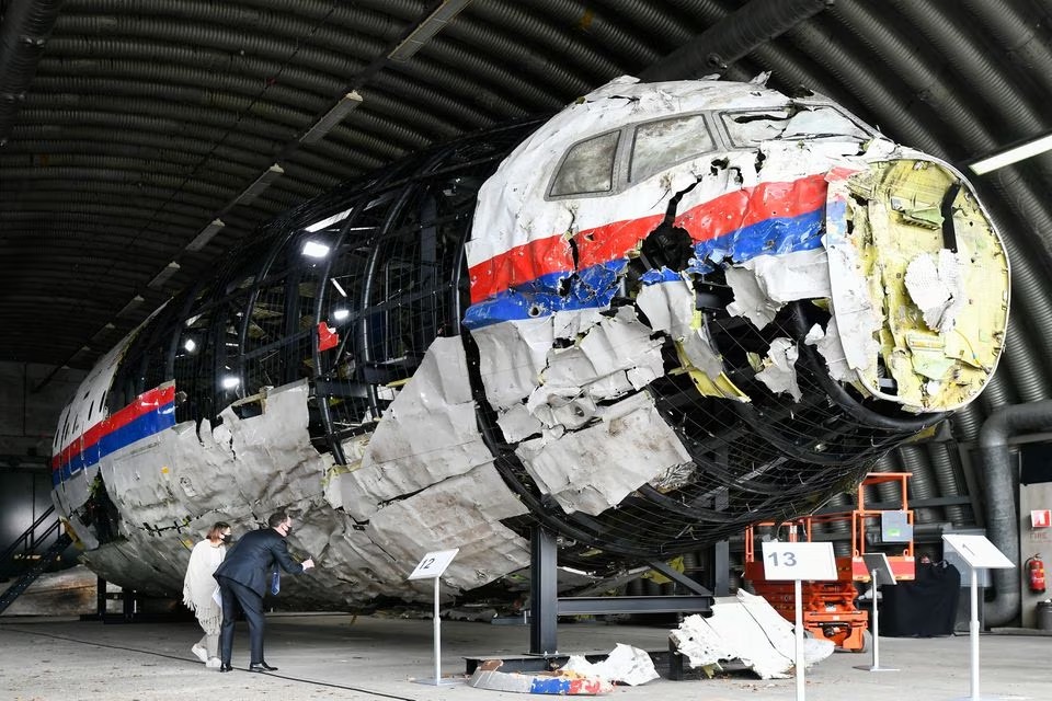 Lawyers attend the judges' inspection of the reconstruction of the MH17 wreckage, as part of the murder trial ahead of the beginning of a critical stage, in Reijen, Netherlands, May 26, 2021. FILE PHOTO: REUTERS/Piroschka van de Wouw