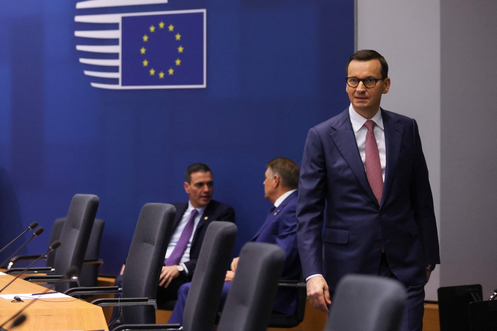 Poland's Prime Minister Mateusz Morawiecki attends a bilateral meeting with EU leaders as part of a EU summit in Brussels, on February 9, 2023.  (Photo by JOHANNA GERON / POOL / AFP)