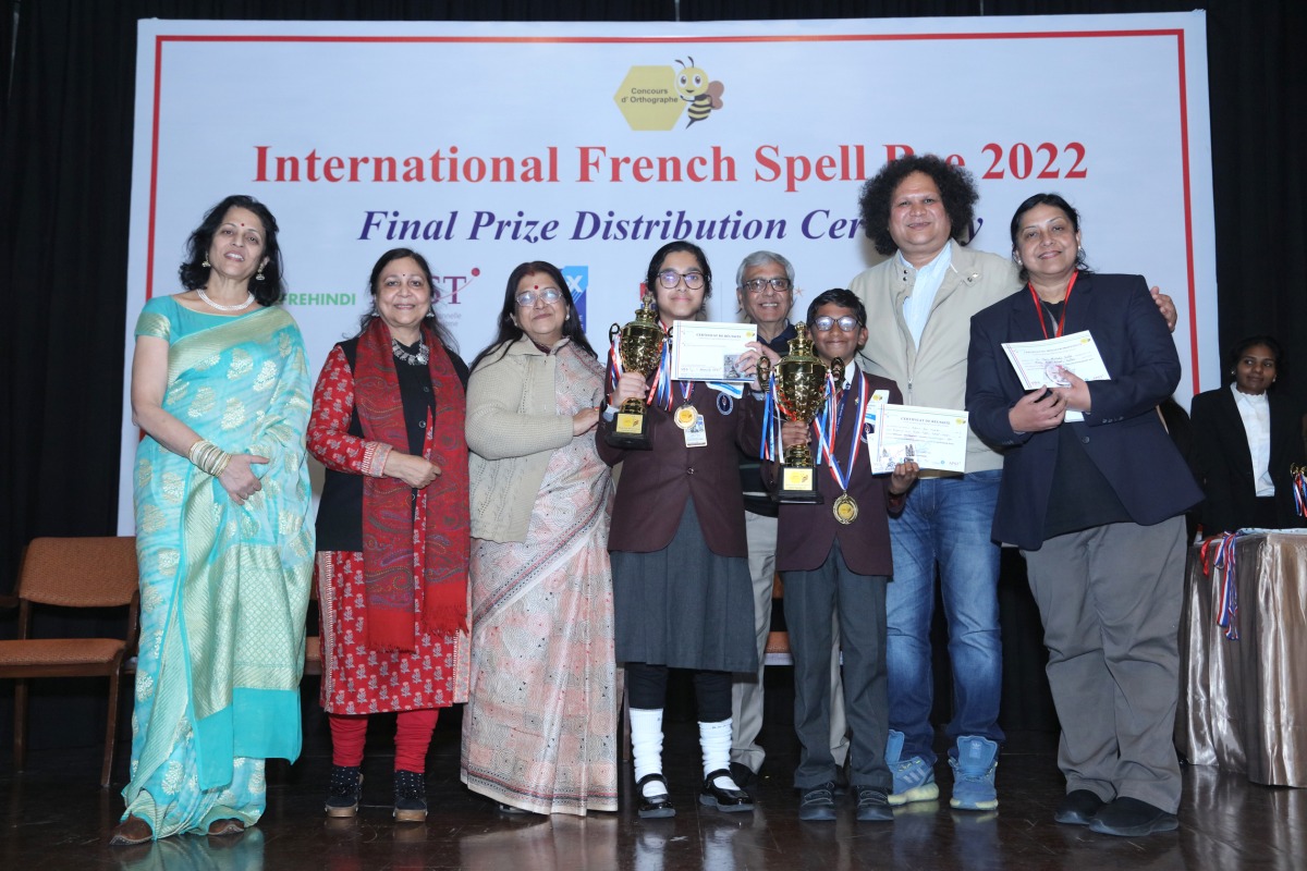 The young Birlites who won the competition with their teachers.  