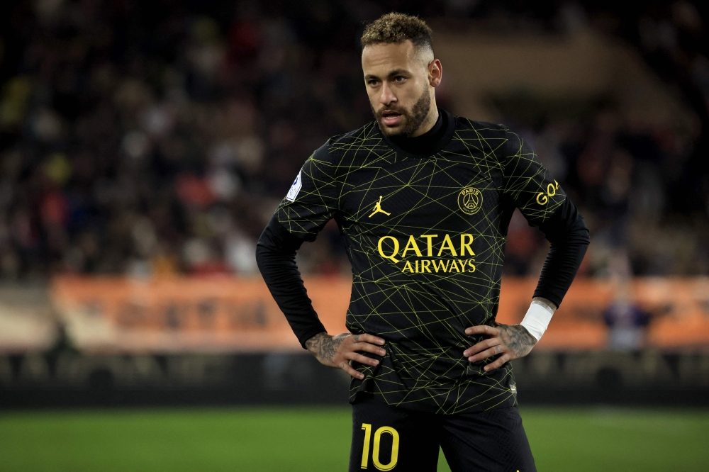 Paris Saint-Germain's Brazilian forward Neymar reacts during the French L1 football match between Monaco and Paris Saint-Germain (PSG) at the Louis II stadium in Monaco on February 11, 2023. (Photo by Valery Hache / AFP)