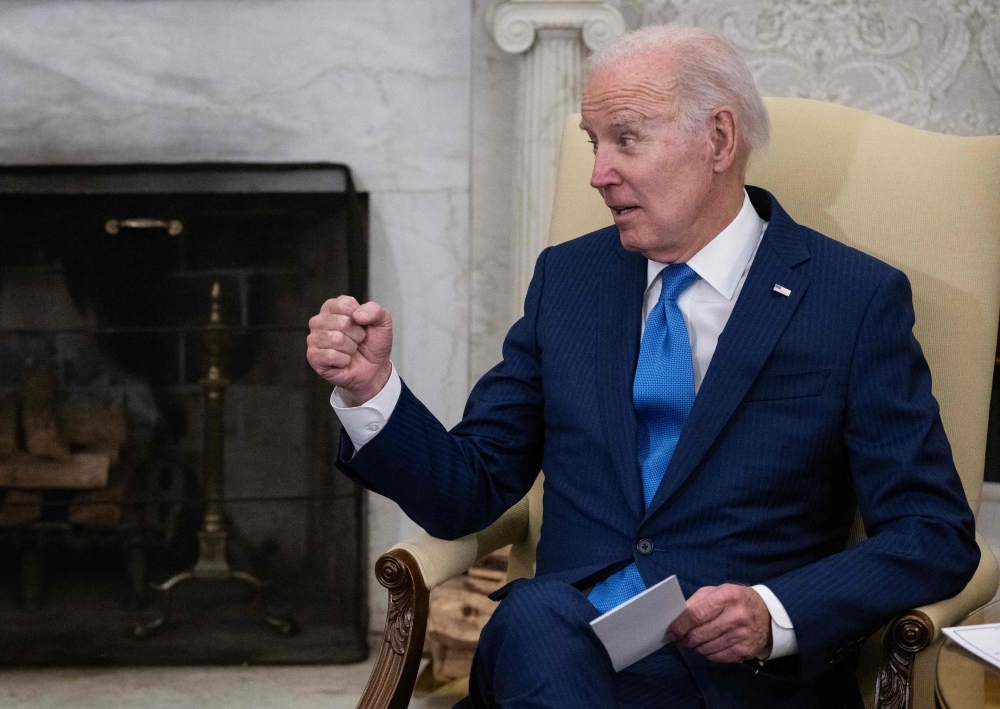 US President Joe Biden speaks during a meeting with Brazilian President Luiz Inacio Lula da Silva in the Oval Office of the White House in Washington, DC, on February 10, 2023. (Photo by ANDREW CABALLERO-REYNOLDS / AFP)

