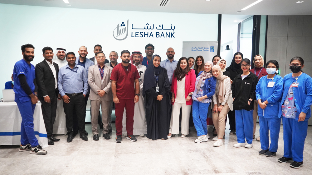 Officials and employees during Lesha Bank Blood donation event.