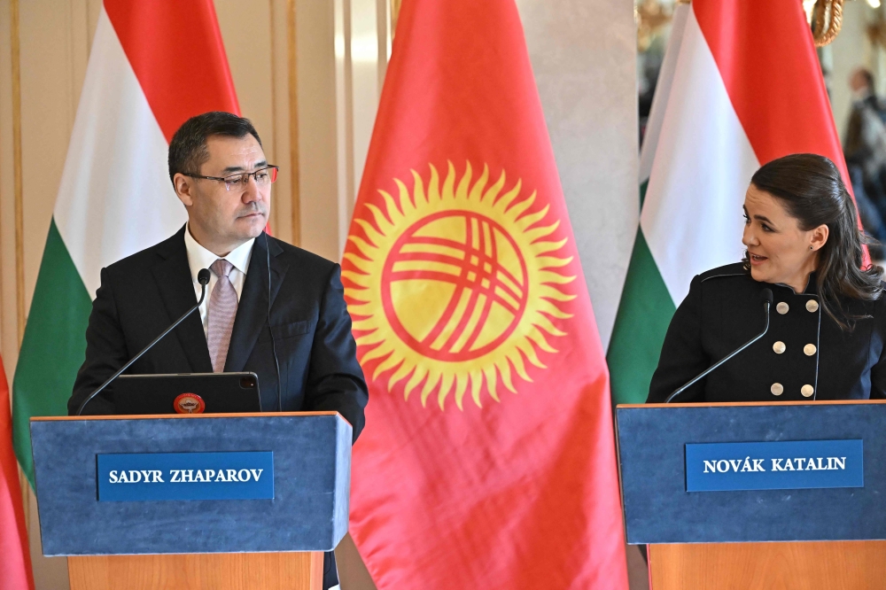 Hungarian President Katalin Novak (right) speaks during a joint press conference with the Kyrgyz President Sadyr Japarov in the presidential palace in Budapest, Hungary, on February 13, 2023. (Photo by Attila KISBENEDEK / AFP)
