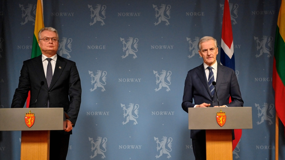 Norwegian Prime Minister Jonas Gahr Stoere (right) and Lithuanian President Gitanas Nauseda address a press conference after their meeting at the prime minister's residence in Oslo on February 13, 2023. (Photo by Annika Byrde / NTB / AFP) / Norway OUT