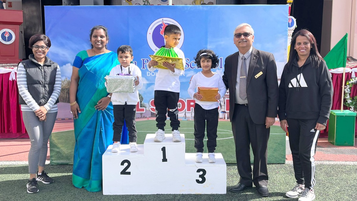 Officials with students at BPS 19th Annual Sports Day.