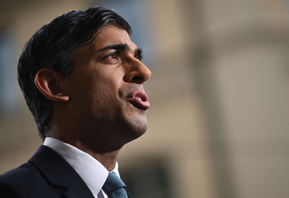 Britain's Prime Minister Rishi Sunak gives a tv interview on the sidelines of the Munich Security Conference (MSC) in Munich, southern Germany, on February 18, 2023.