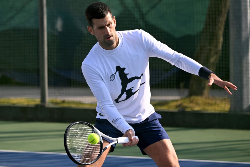 Serbian tennis player Novak Djokovic attends a training session in Belgrade on February 22, 2023. (Photo by ANDREJ ISAKOVIC / AFP)