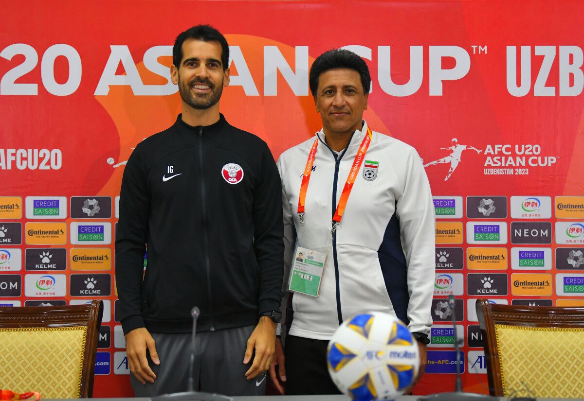  Qatar head coach Inaki Abadia with Iran coach Abdolsamad Marfavi at a pre-match press conference yesterday.