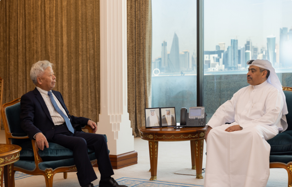  Minister of Finance H E Ali bin Ahmed Al Kuwari in conversation with the President of the Asian Infrastructure Investment Bank Jin Liqun.