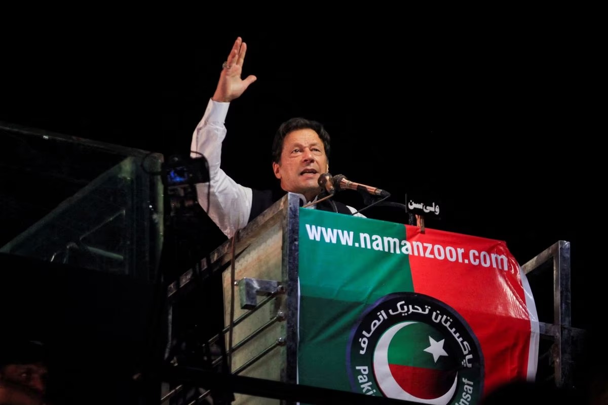 File Photo: Former Pakistani Prime Minister Imran Khan gestures as he addresses supporters during a rally, in Lahore, Pakistan April 21, 2022. (REUTERS/Mohsin Raza)

