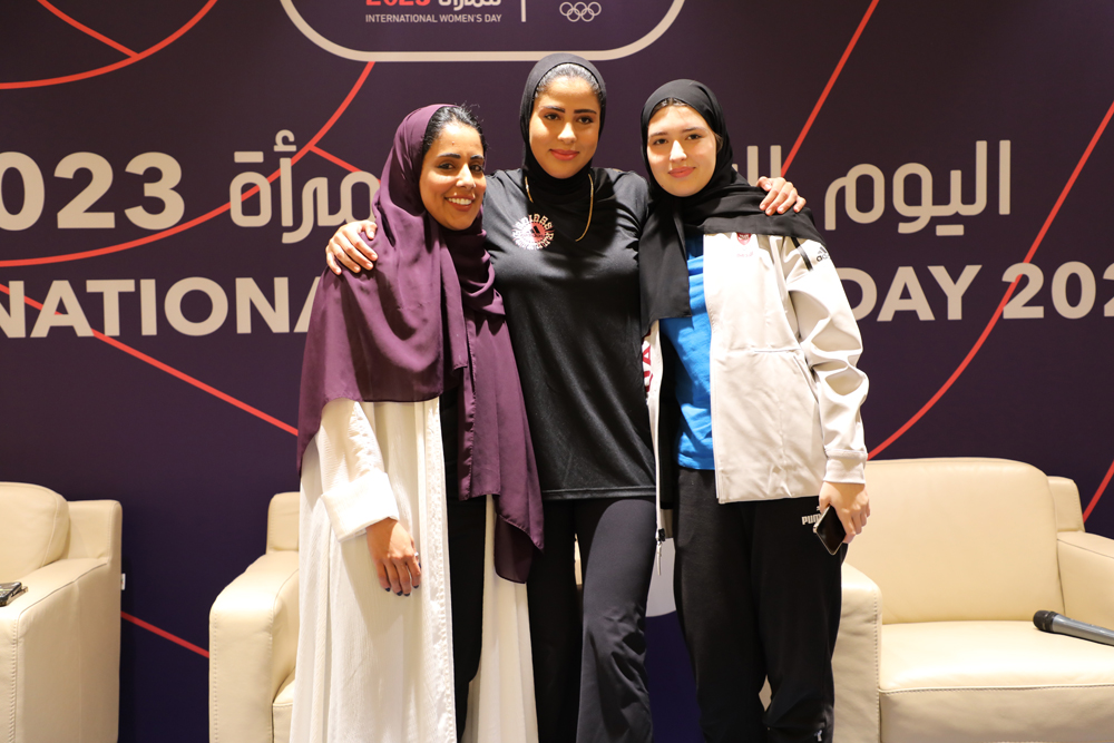 Qatar’s fencer Lina Al Buainain, 400m hurdler Mariam Fareed and Wyld Gym founder Haya Burshaid pose after the panel discussion during the International Women’s Day event, organised by the Qatar Olympic Committee at Al Shaqab yesterday.