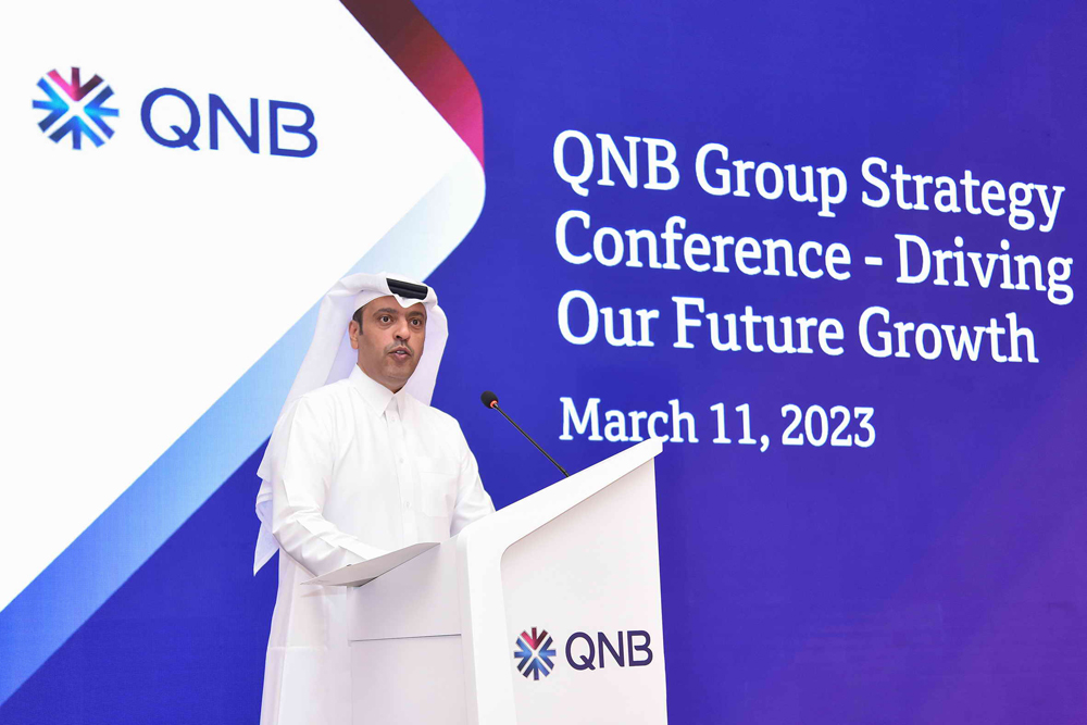 A QNB Group official addressing the annual strategy conference in Doha. 
