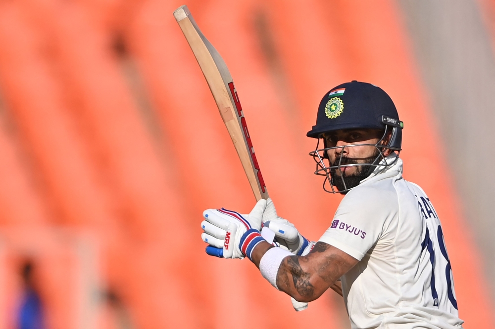 India's Virat Kohli plays a shot during the third day of the fourth and final Test cricket match between India and Australia at the Narendra Modi Stadium in Ahmedabad on March 11, 2023. Photo by Punit PARANJPE / AFP
