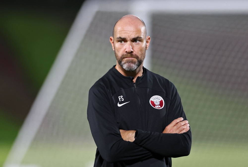 In this file photo taken on November 28, 2022, Qatar's Spanish coach Felix Sanchez looks on during a training session at the Aspire Zone Training Site in Doha, on the eve of the Qatar 2022 World Cup football match between Netherlands and Qatar. Photo by KARIM JAAFAR / AFP