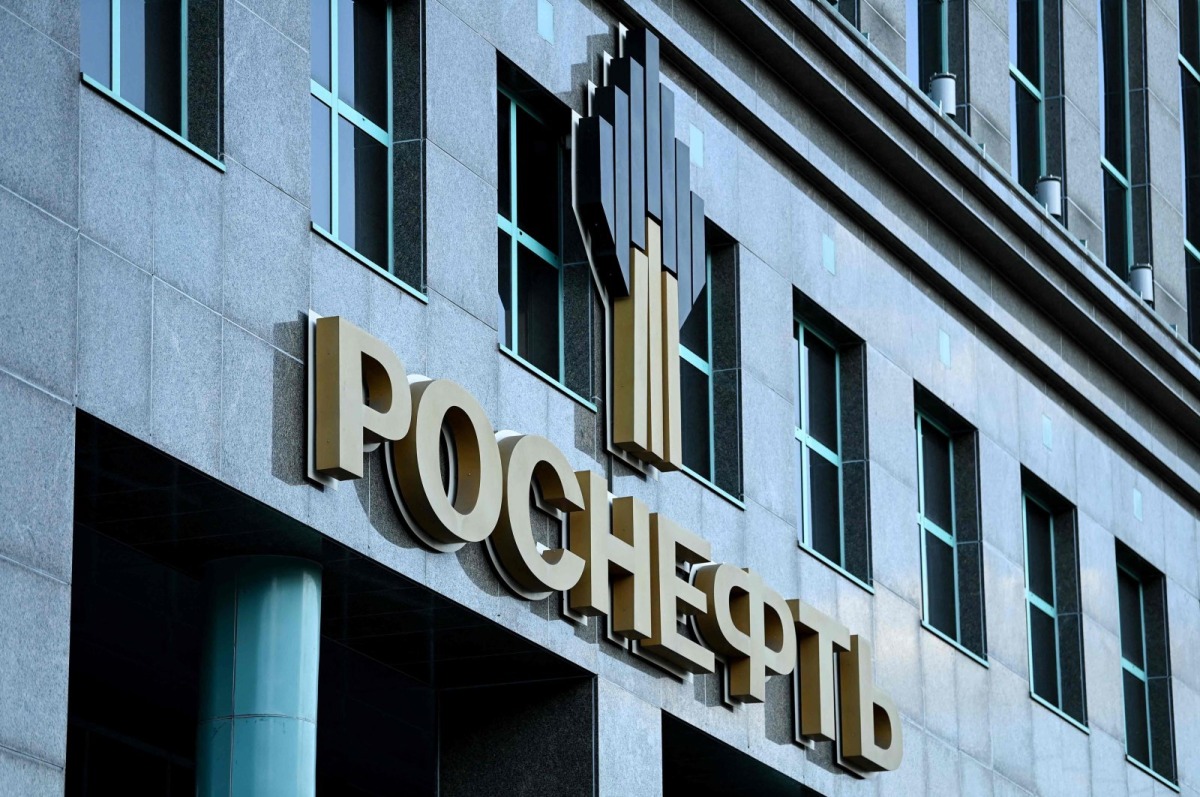 This file photo shows the logo of Russia's oil producer Rosneft on its headquarters in Moscow, Russia, on August 13, 2021.  File photo / AFP
