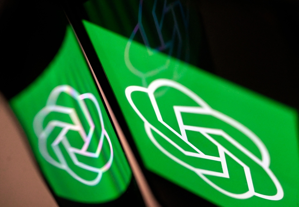 This illustration picture shows the ChatGPT logo displayed on a smartphone in Washington, DC, on March 15, 2023.  (Photo by OLIVIER DOULIERY / AFP)