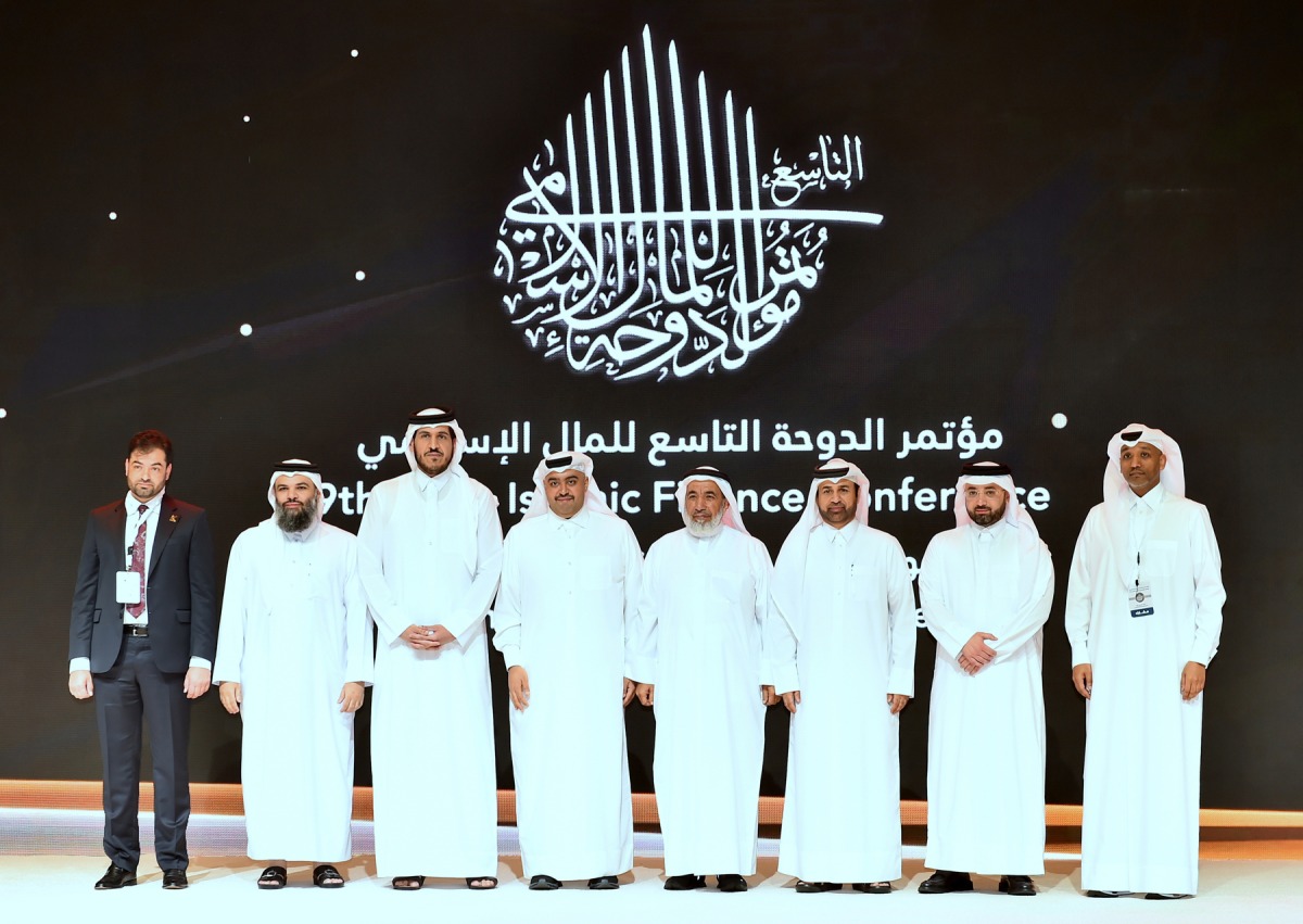 Minister of Commerce and Industry H E Sheikh Mohammed bin Hamad bin Qassim Al Abdullah Al Thani (third left) with other officials at the conference. 