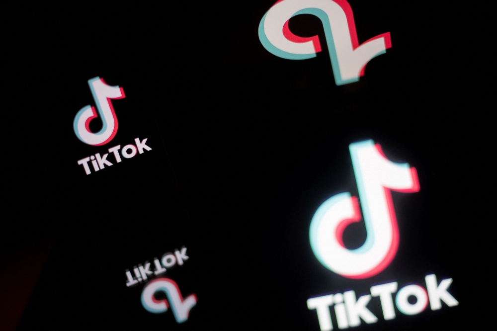 This file photo taken on January 21, 2021, in Nantes, western France shows the screen of a smartphone displaying the logo of Chinese social network Tik Tok. - The BBC said Monday March 20, that it had told staff to delete Chinese-owned video app TikTok unless it was needed for business reasons, with Western institutions increasingly taking a harder stance over data collection fears. (Photo by LOIC VENANCE / AFP)