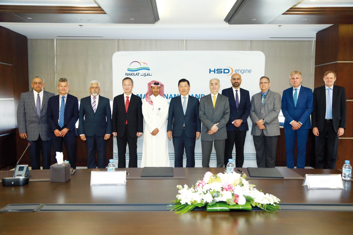 Qatar Gas Transport Company and HSD Engine officials at the signing ceremony.