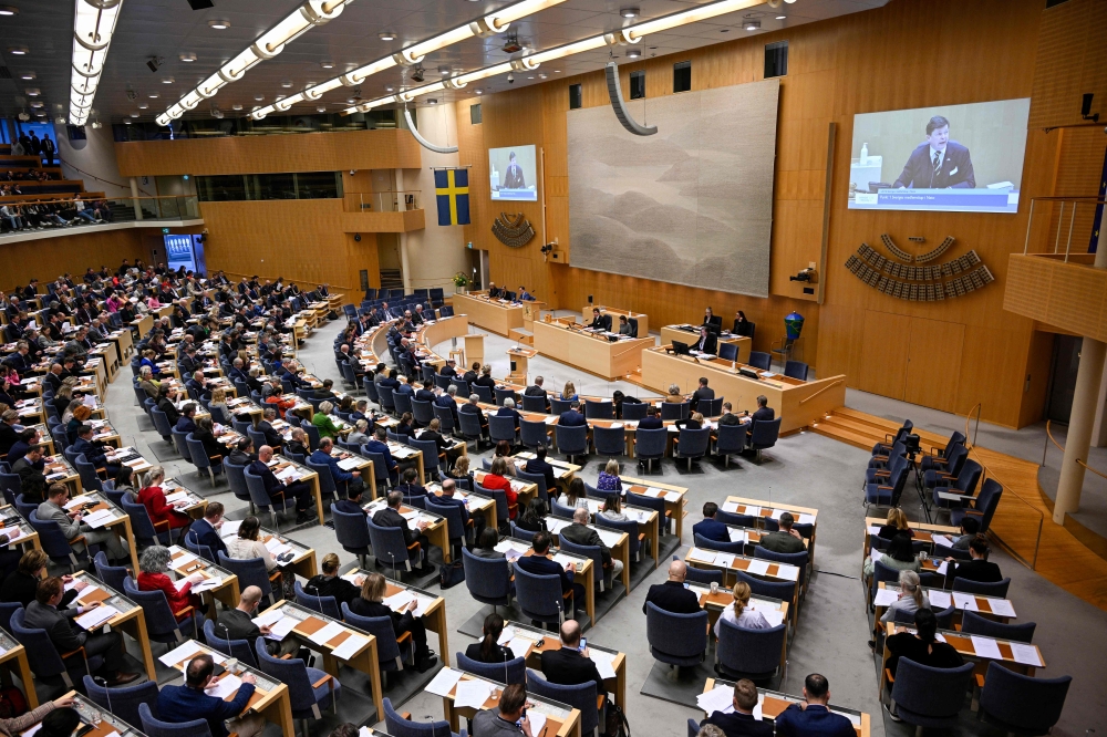 Sweden's parliament votes on Sweden's NATO membership, in Stockholm on March 22, 2023. - Sweden's parliament voted on March 22, 2023 in favour of joining NATO despite delays by Hungary and Turkey to ratify its membership bid, which will likely lead to Sweden joining after neighbouring Finland. (Photo by Anders WIKLUND / TT News Agency / AFP)