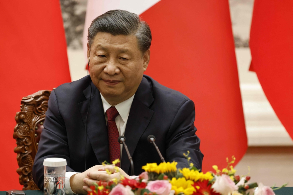 China's  President Xi Jinping attends a joint press conference with French President Emmanuel Macron (not pictured) in Beijing on April 6, 2023. (Photo by LUDOVIC MARIN / AFP)
