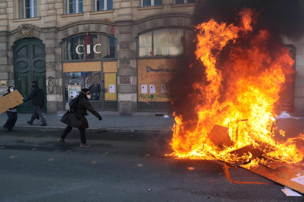 Photo by LOU BENOIST / AFP

