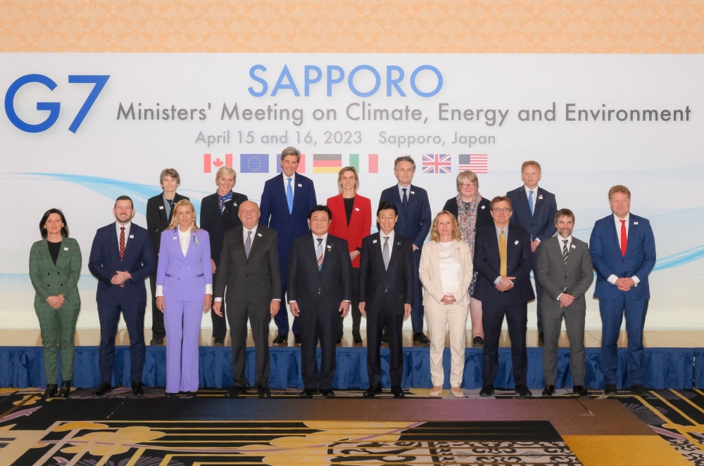 This handout photo taken and released on April 15, 2023 by the Japanese Government痴 official photographer shows a group photo of participants in the G7 Ministers' Meeting on Climate, Energy and Environment in Sapporo, Hokkaido prefecture on April 15, 2023. (Photo by Handout / Japanese Government / AFP)