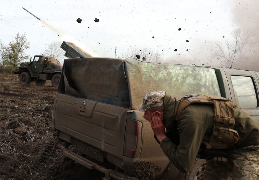 Artillerymen of the Ukrainian 80th separate airborne assault brigade fire from a BM-21 Grad multiple rocket launcher towards Russian positions on the front line near Bakhmut in the Donetsk region, on April 18, 2023, amid the Russian invasion of Ukraine. (Photo by Anatolii Stepanov / AFP)