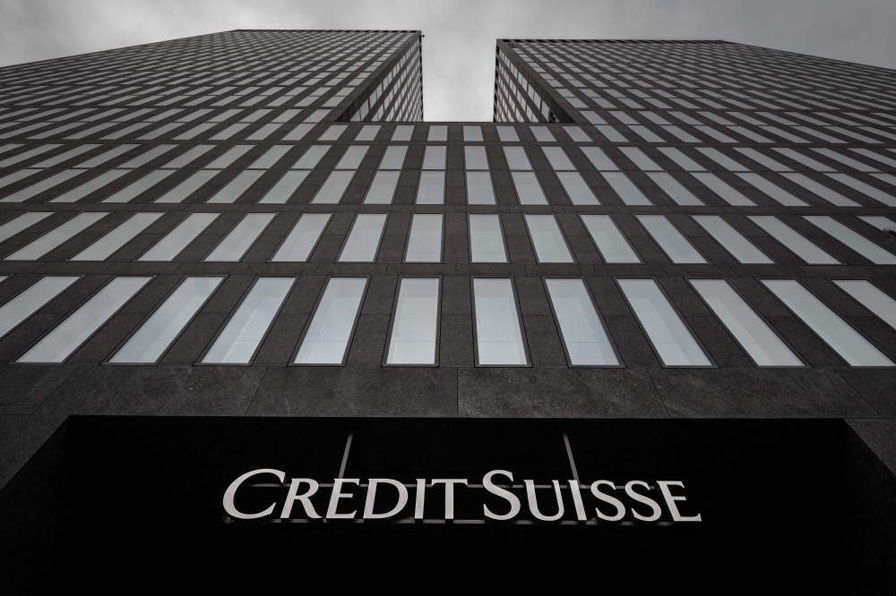 A photograph shows a logo of Credit Suisse bank in Zurich, on March 23, 2023. aPhoto by Fabrice COFFRINI / AFP